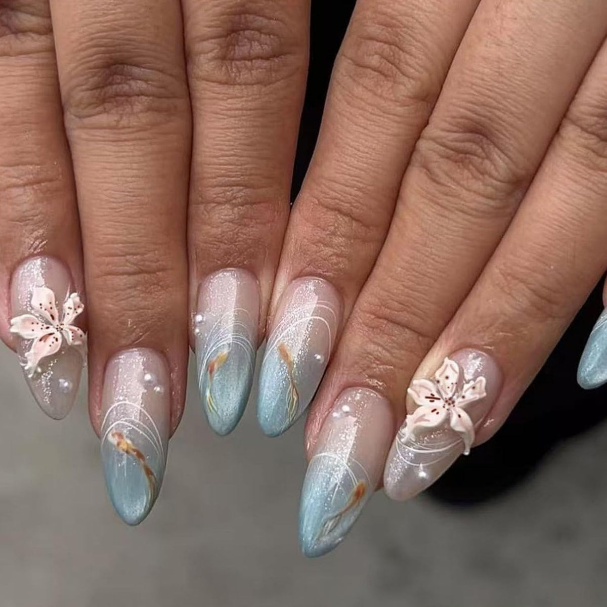Cat Eye Press on Nails Medium Almond Fake Nails with 3D Flower White Pearl Lines Designs Glossy Nails Press Ons Blue Gradient Glue on Nails Summer Acrylic Artificial Stick on Nails for Women 24Pcs